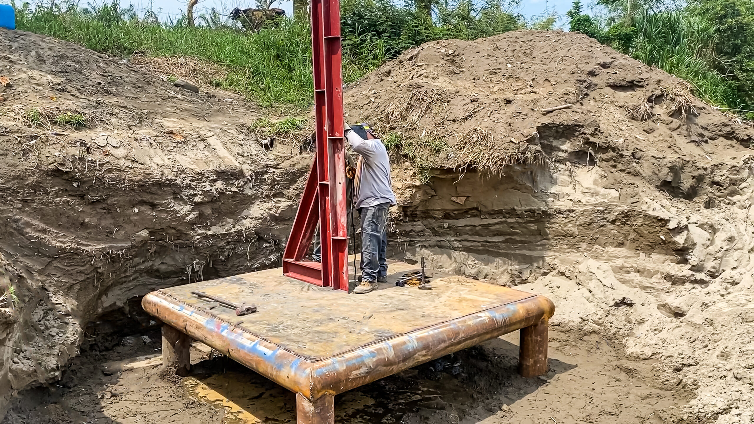 Barrier anchors and installation in the Motagua River